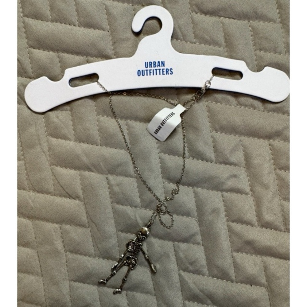 Urban Outfitters Metallic Skeleton Charm Necklace
